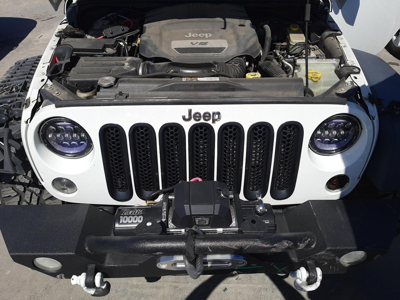 Foto 7 de la subasta – 2014 JEEP WRANGLER U con VIN 1C4BJWDG9EL251069