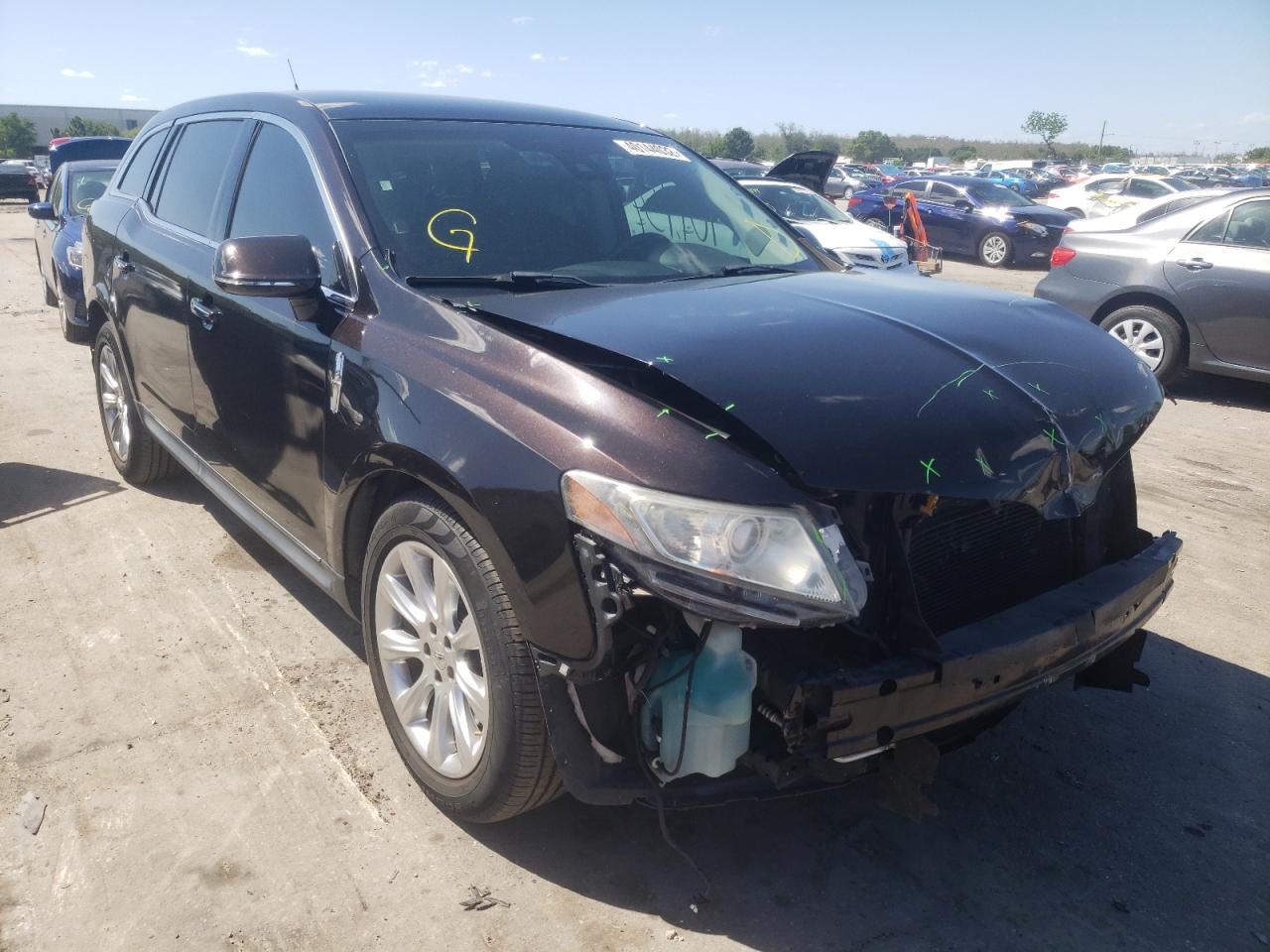 LINCOLN MKT 2014 with VIN 2LMHJ5AT9EBL51159 - Photo from auction