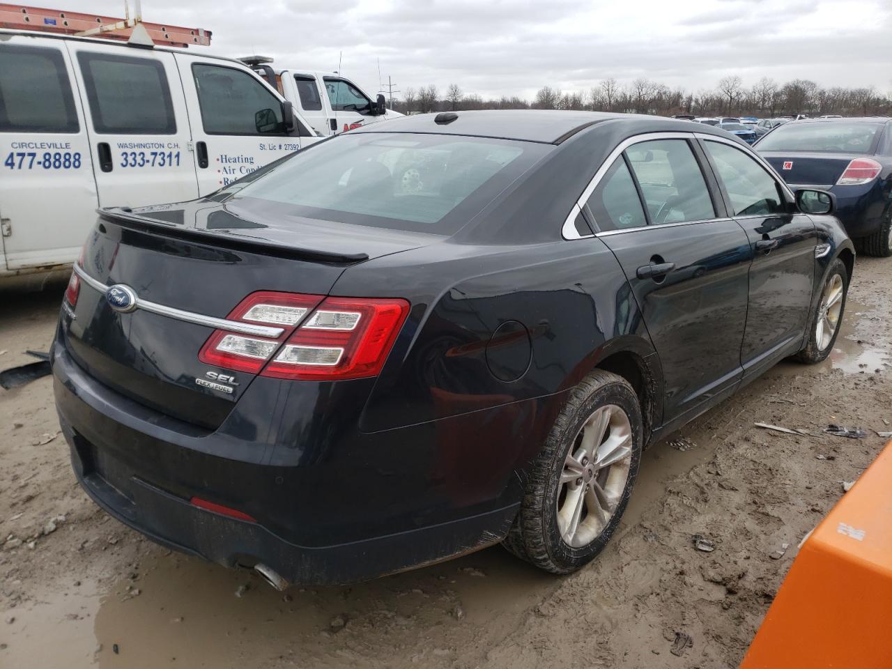 Photo 4 from auction – 2013 FORD TAURUS SEL with VIN 1FAHP2E88DG107602