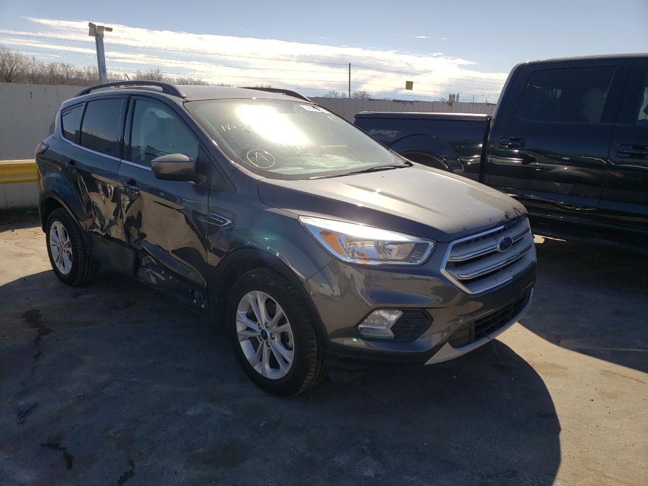 Photo 1 from auction – 2018 FORD ESCAPE SE with VIN 1FMCU0GD1JUB24780