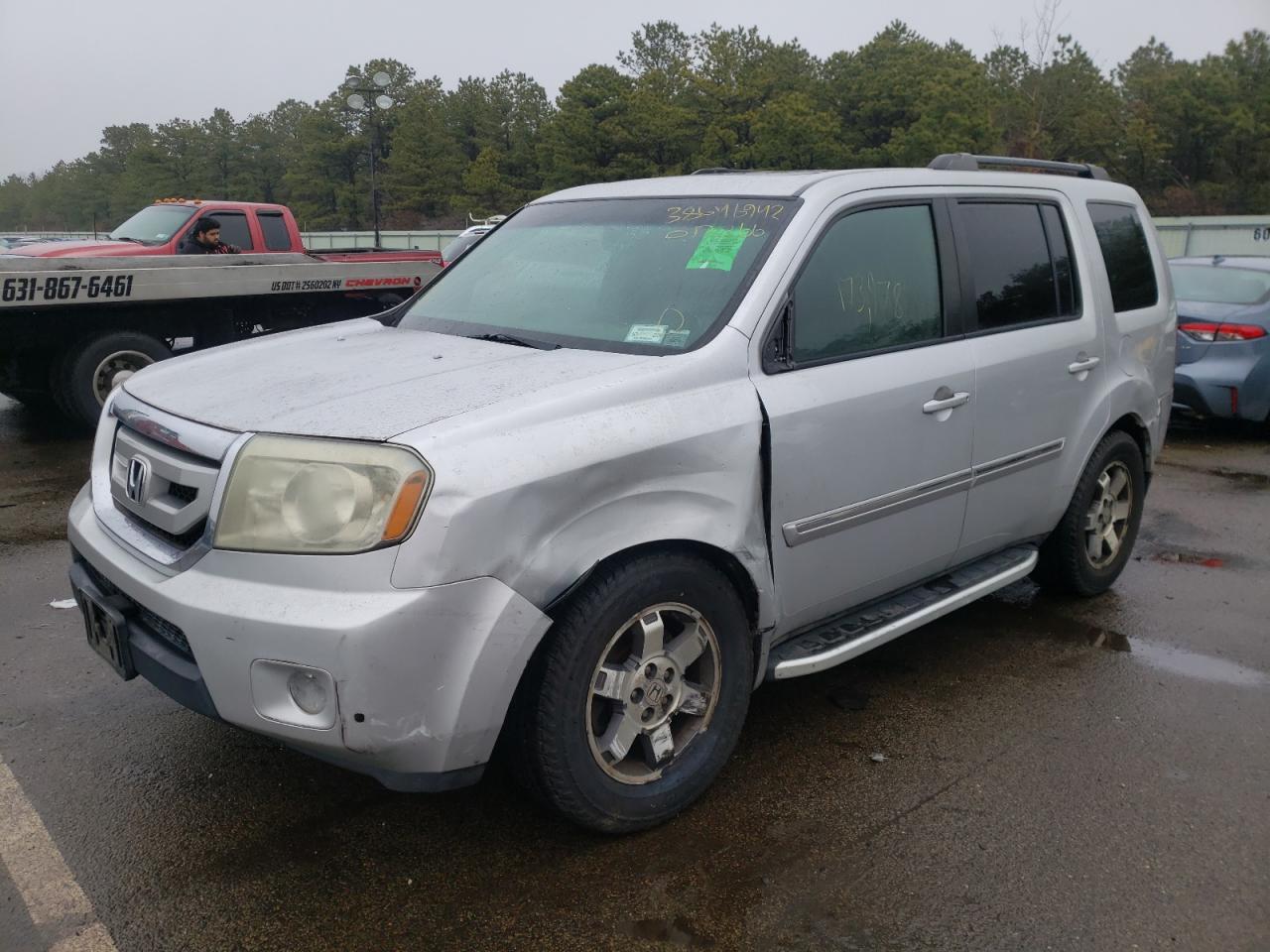 Photo 2 from auction – 2009 HONDA PILOT TOUR with VIN 5FNYF48869B012266