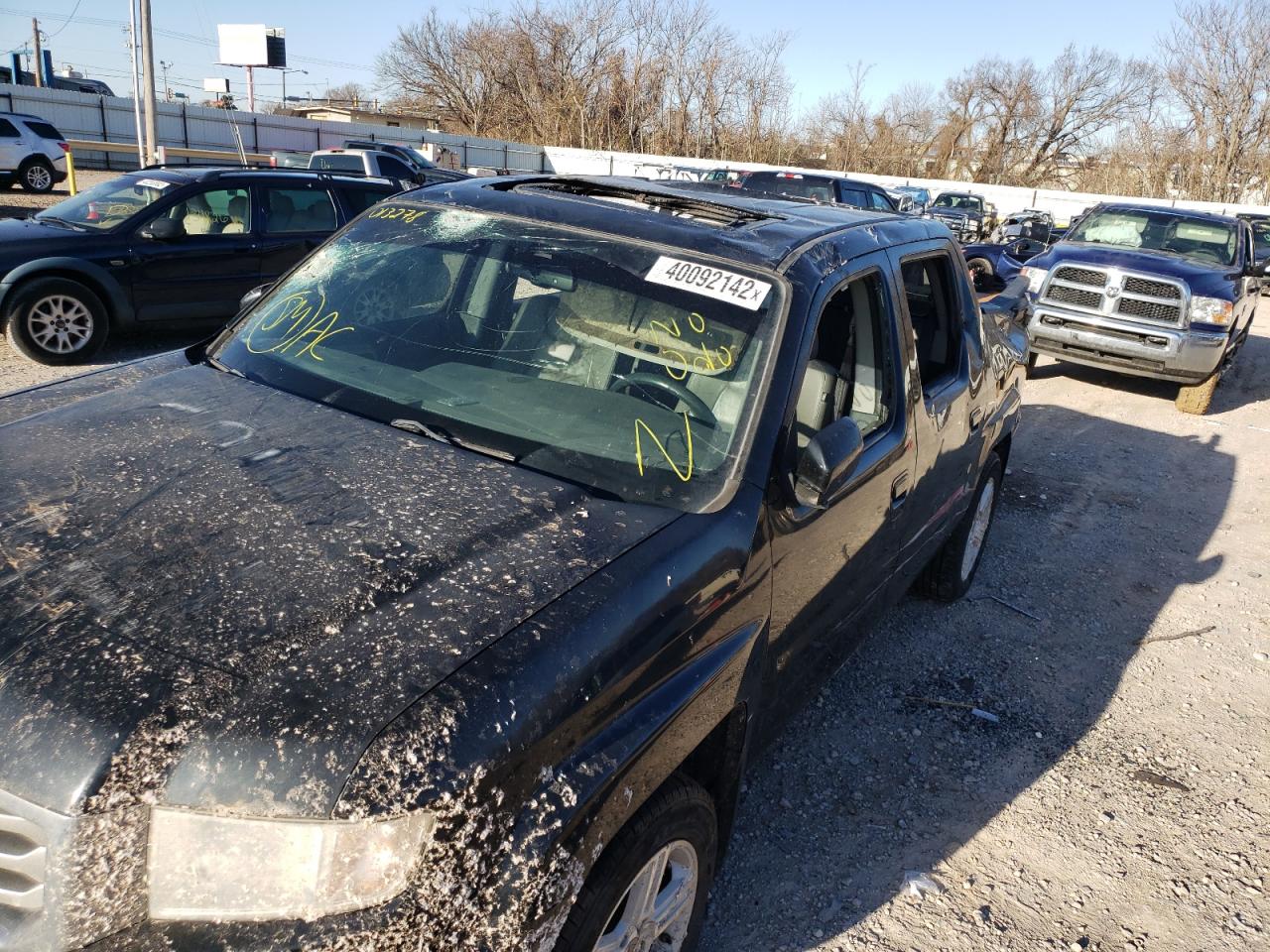 Photo 9 from auction – 2013 HONDA RIDGELINE with VIN 5FPYK1F53DB013278