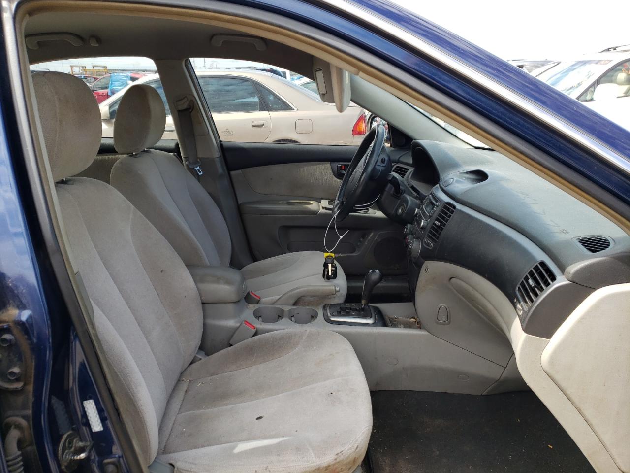 Photo 5 from auction – 2007 KIA OPTIMA LX with VIN KNAGE123375122956
