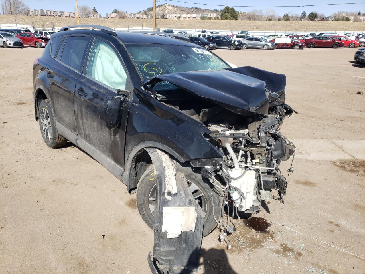 TOYOTA RAV4 LE 2018 with VIN 2T3BFREV6JW720397 - Photo from auction