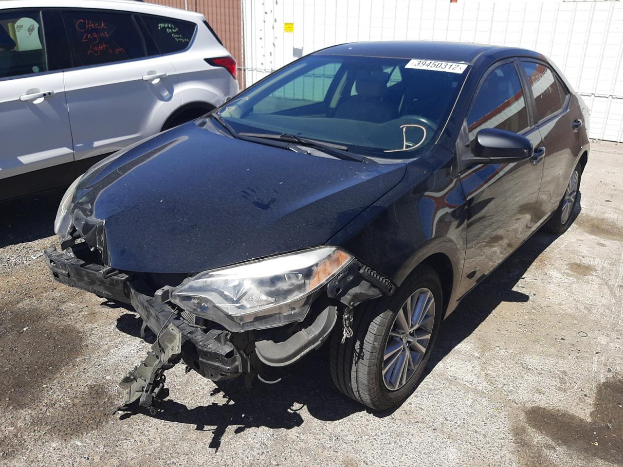 Photo 2 from auction – 2014 TOYOTA COROLLA L with VIN 2T1BURHE4EC116705