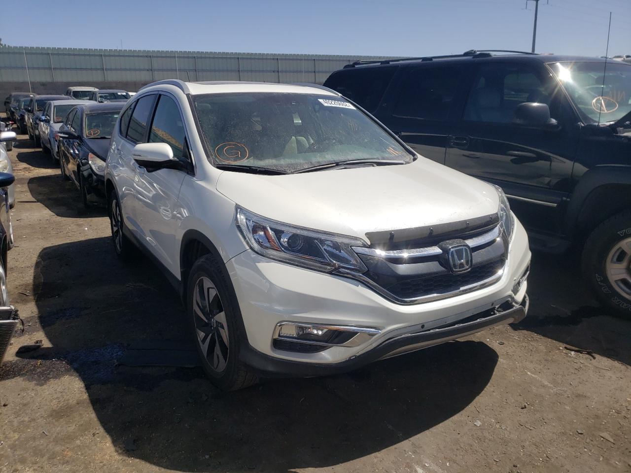 HONDA CR-V TOURI 2016 with VIN 5J6RM3H99GL008360 - Photo from auction