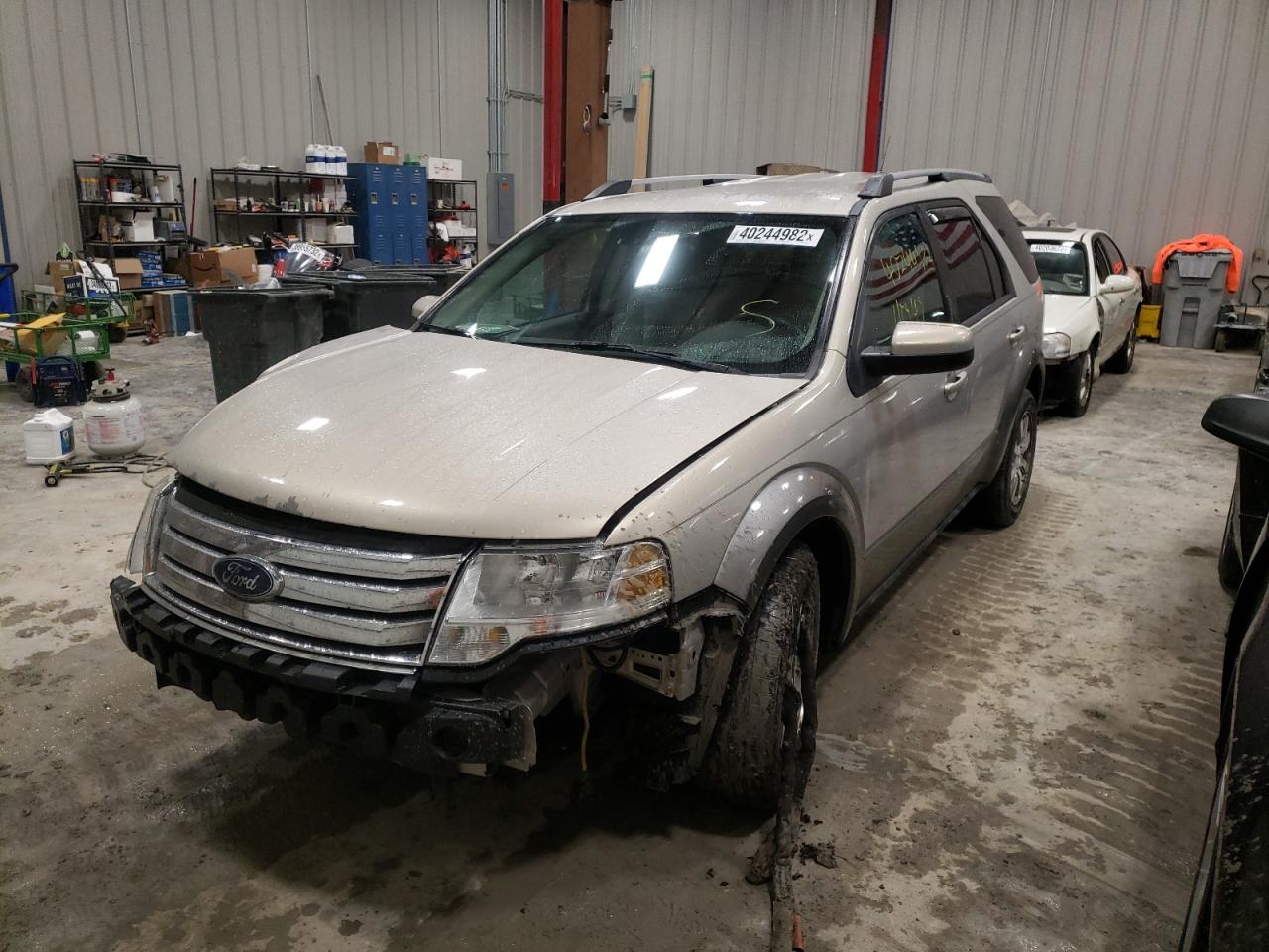 Photo 2 from auction – 2009 FORD TAURUS X S with VIN 1FMDK02W79GA06312