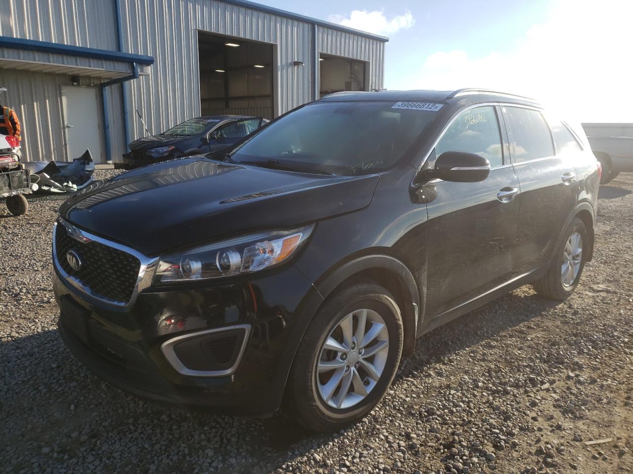 Photo 2 from auction – 2016 KIA SORENTO LX with VIN 5XYPG4A50GG054060