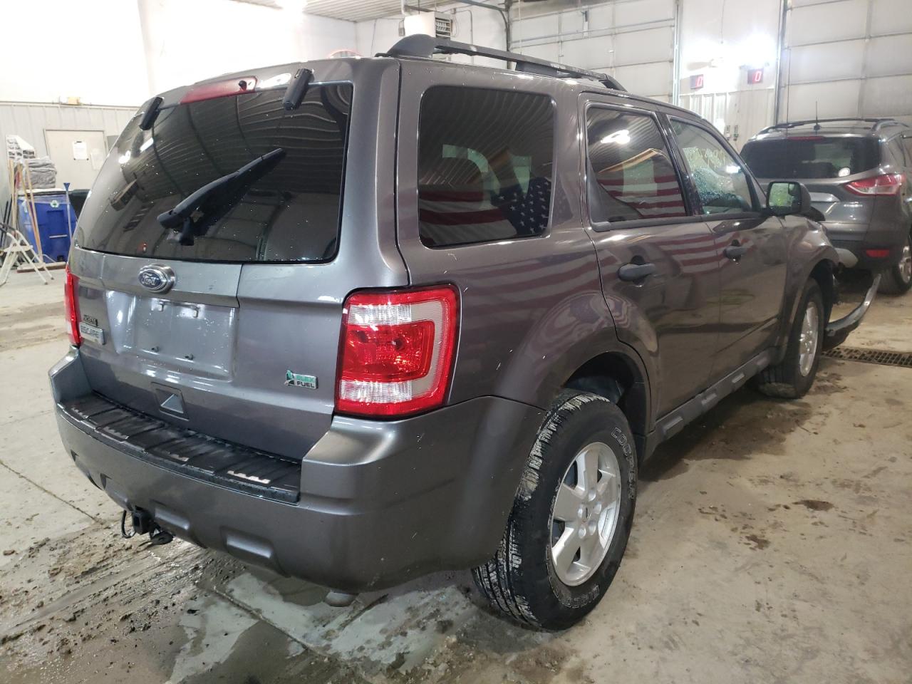Photo 4 from auction – 2010 FORD ESCAPE XLT with VIN 1FMCU9DG2AKA85437
