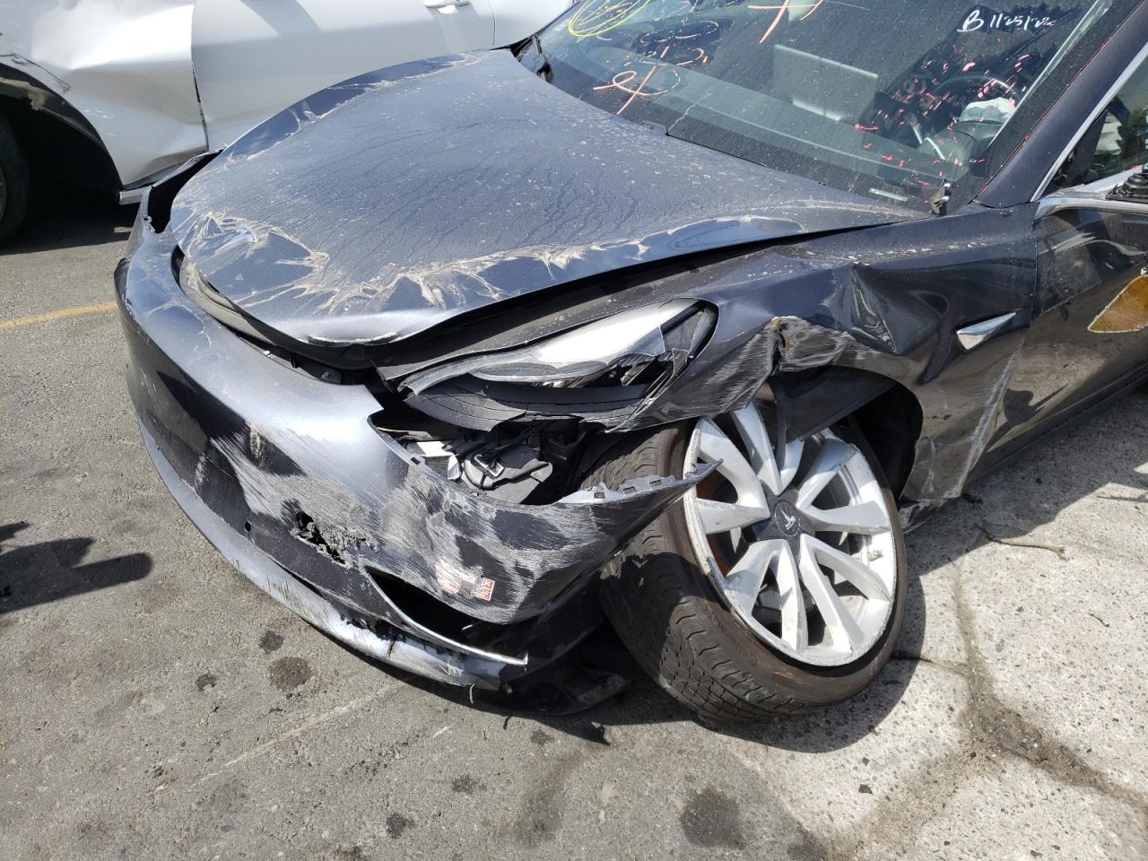 Photo 9 from auction – 2018 TESLA MODEL 3 with VIN 5YJ3E1EA1JF042556