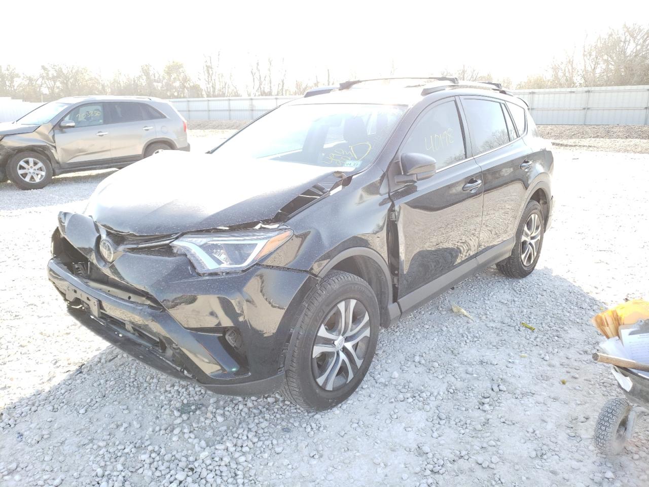 Photo 2 from auction – 2018 TOYOTA RAV4 LE with VIN 2T3ZFREV7JW490903