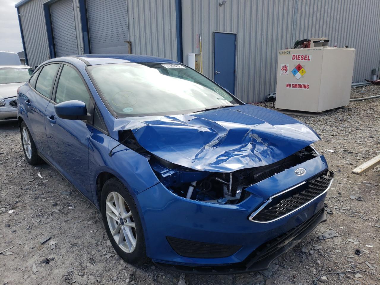 FORD FOCUS SE 2018 with VIN 1FADP3FE2JL221445 - Photo from auction