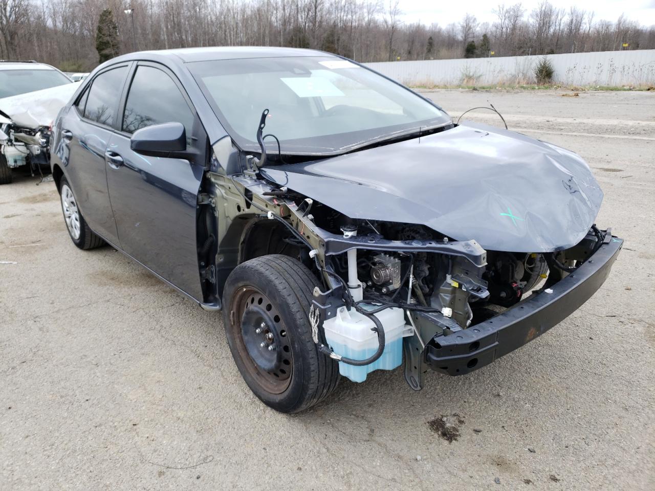 TOYOTA COROLLA L 2017 with VIN 5YFBURHE2HP699697 - Photo from auction