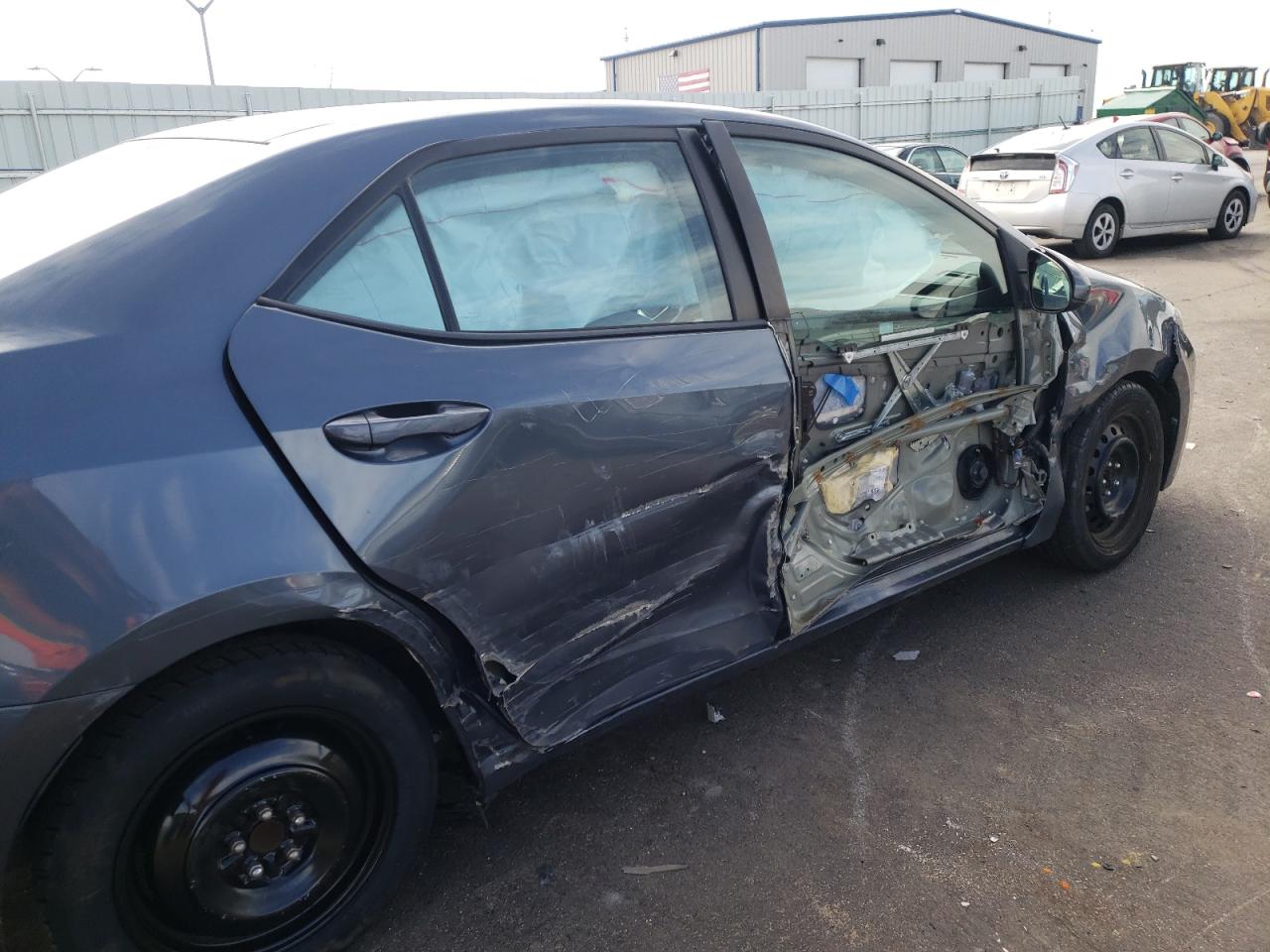 Photo 9 from auction – 2014 TOYOTA COROLLA L with VIN 2T1BURHEXEC114599