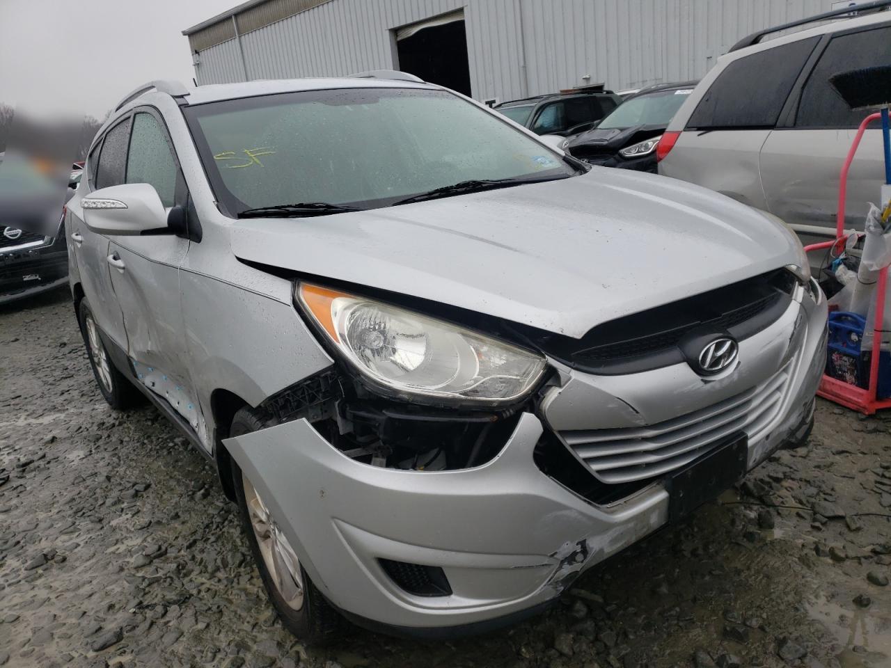 HYUNDAI TUCSON GLS 2012 with VIN KM8JUCAC6CU395880 - Photo from auction