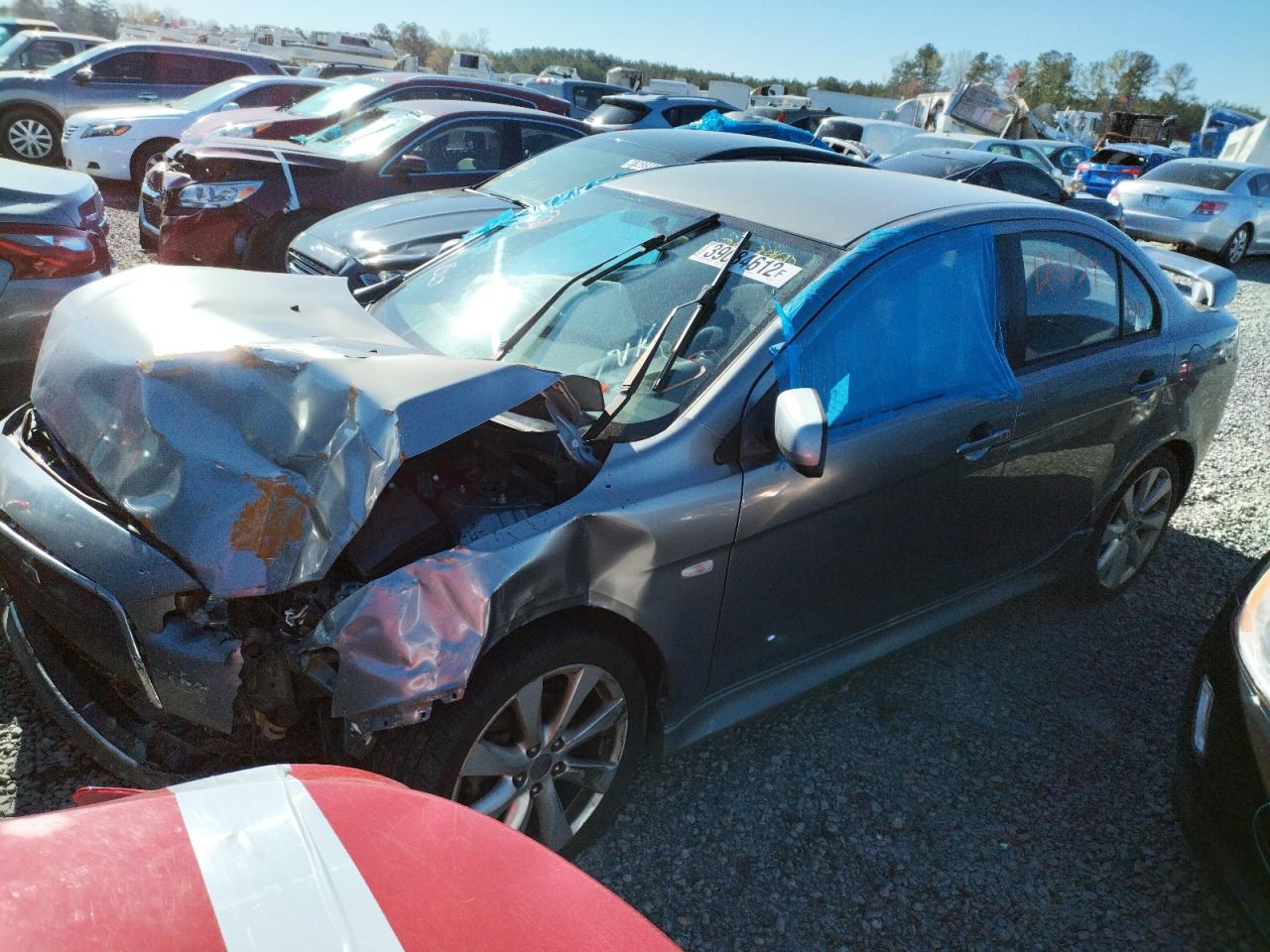 Photo 2 from auction – 2012 MITSUBISHI LANCER with VIN JA32U8FW0CU009882