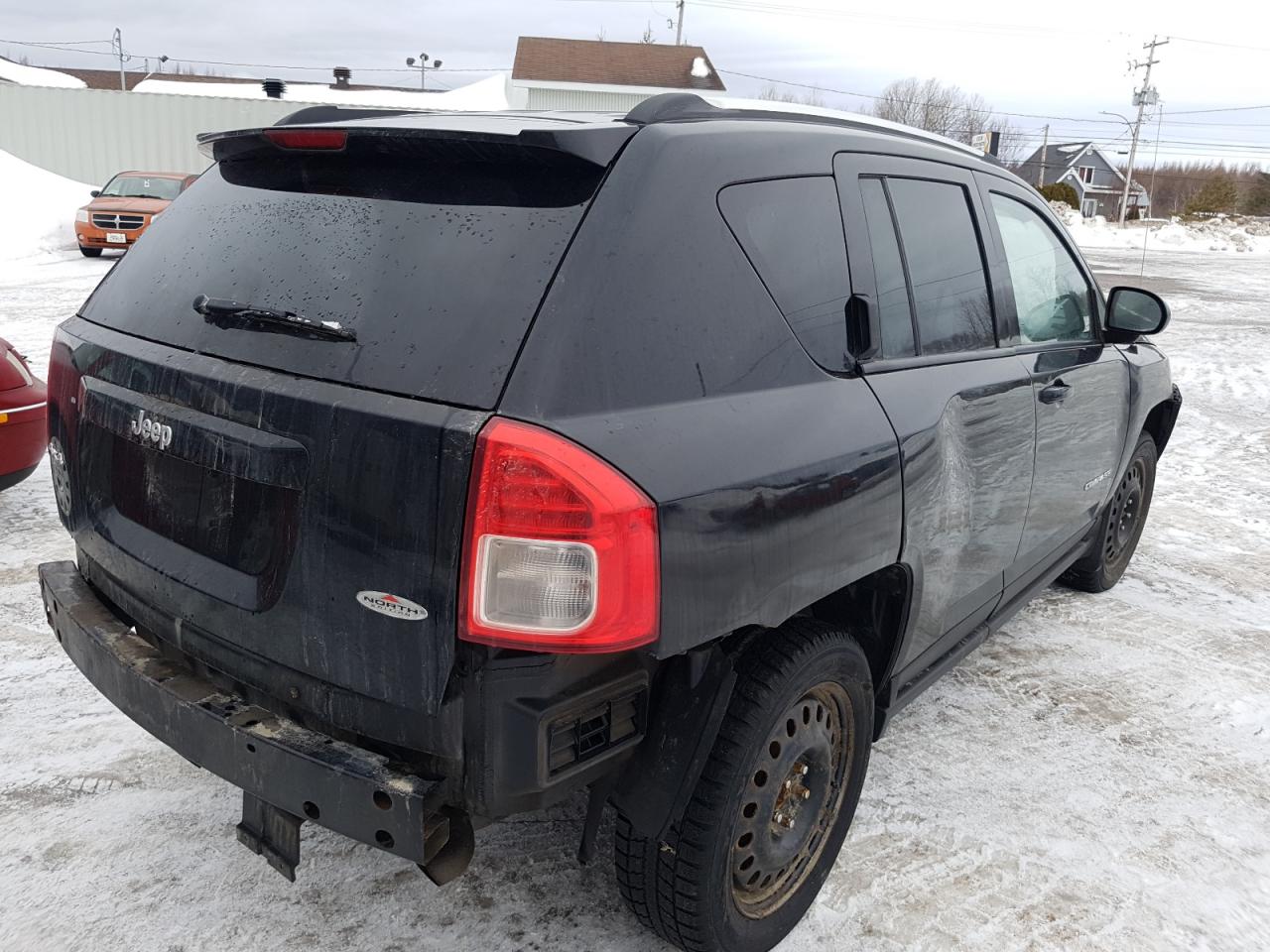 Photo 4 from auction – 2012 JEEP COMPASS with VIN 1C4NJDAB4CD575614