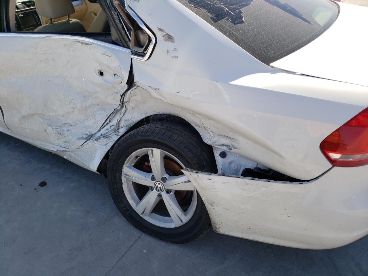 Photo 9 from auction – 2012 VOLKSWAGEN PASSAT SE with VIN 1VWBP7A33CC038909