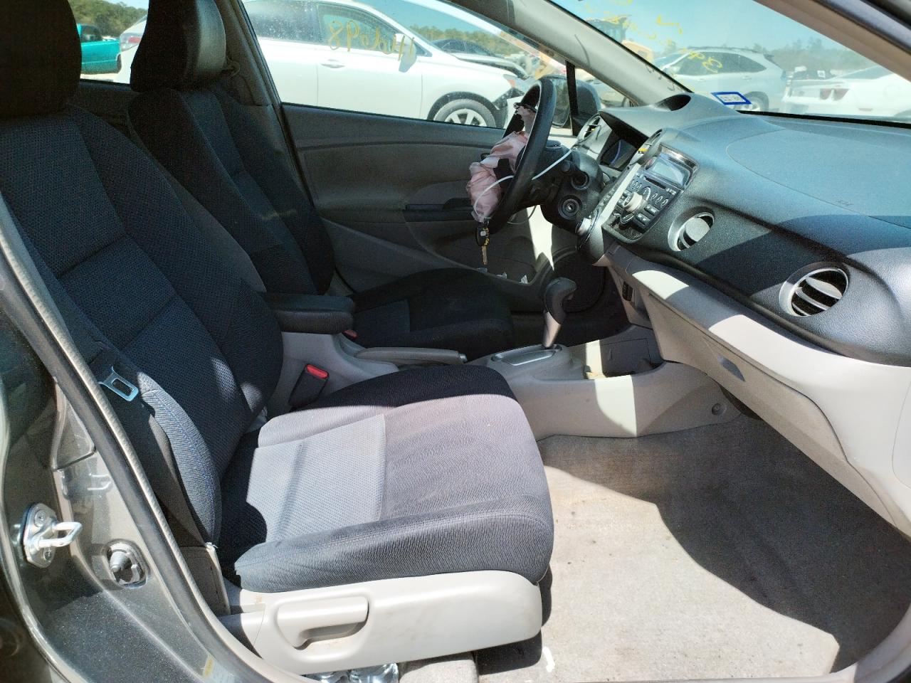 Photo 5 from auction – 2011 HONDA INSIGHT LX with VIN JHMZE2H59BS009175