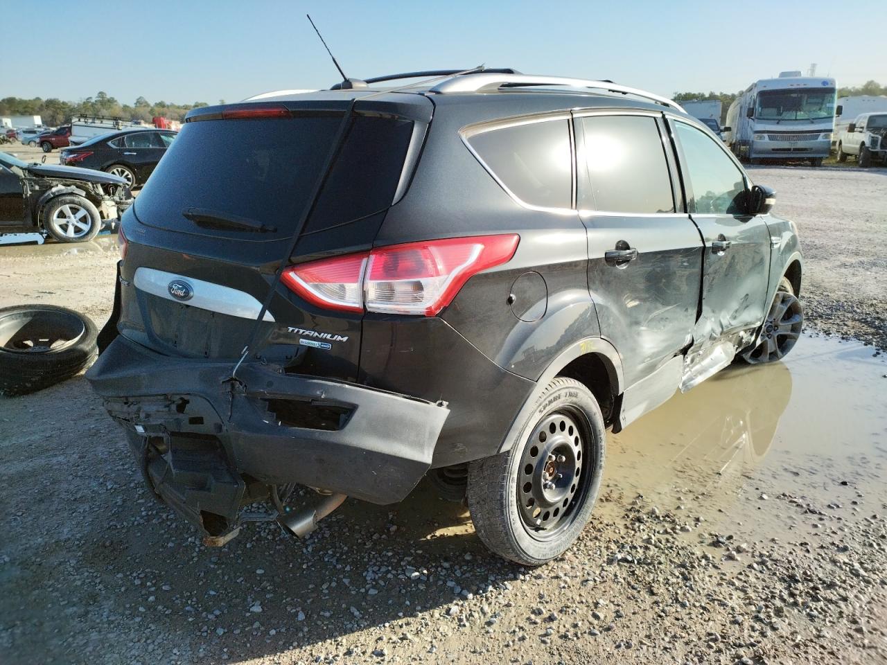 Photo 4 from auction – 2014 FORD ESCAPE TIT with VIN 1FMCU9JX0EUA65489