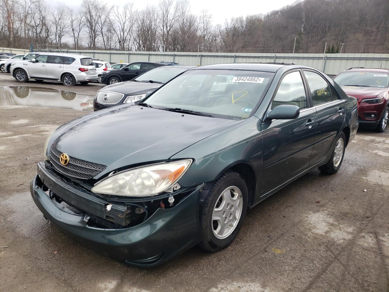 Photo 2 from auction – 2002 TOYOTA CAMRY LE with VIN JTDBE32K220028508