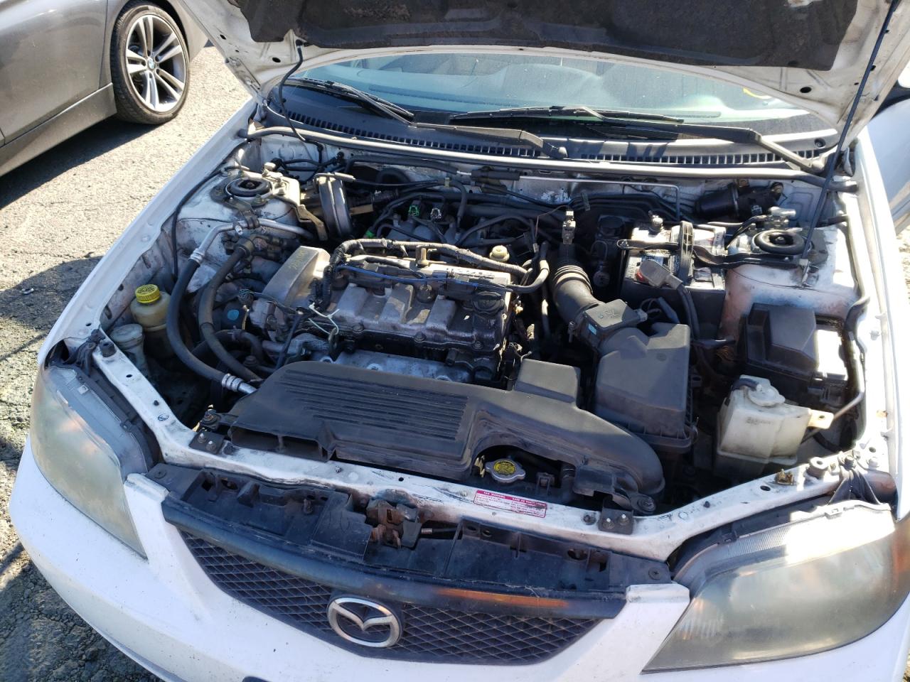 Photo 7 from auction – 2003 MAZDA PROTEGE DX with VIN JM1BJ225230200201
