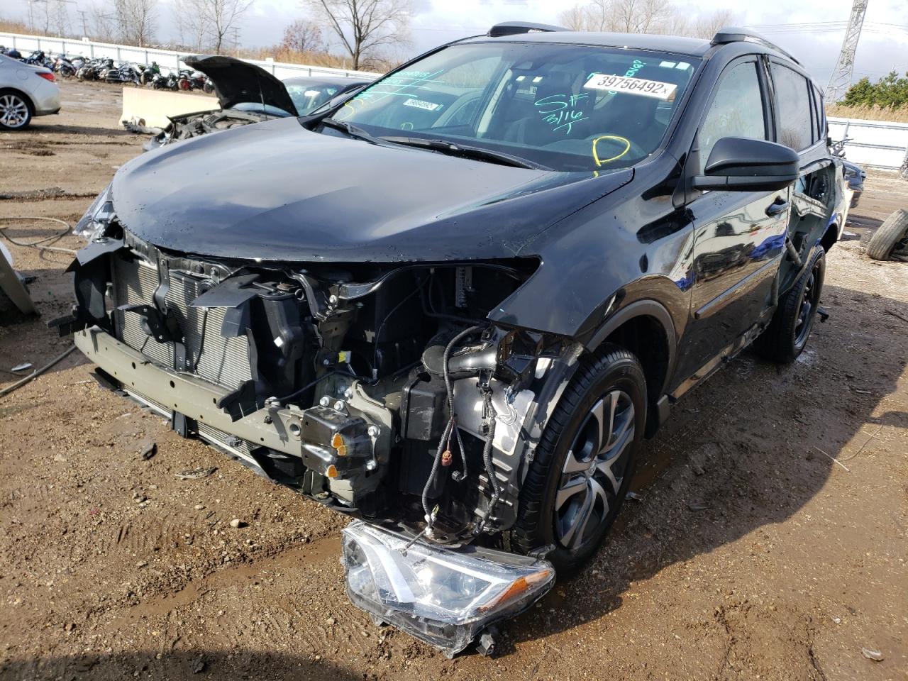 Photo 2 from auction – 2018 TOYOTA RAV4 LE with VIN 2T3ZFREV7JW518408