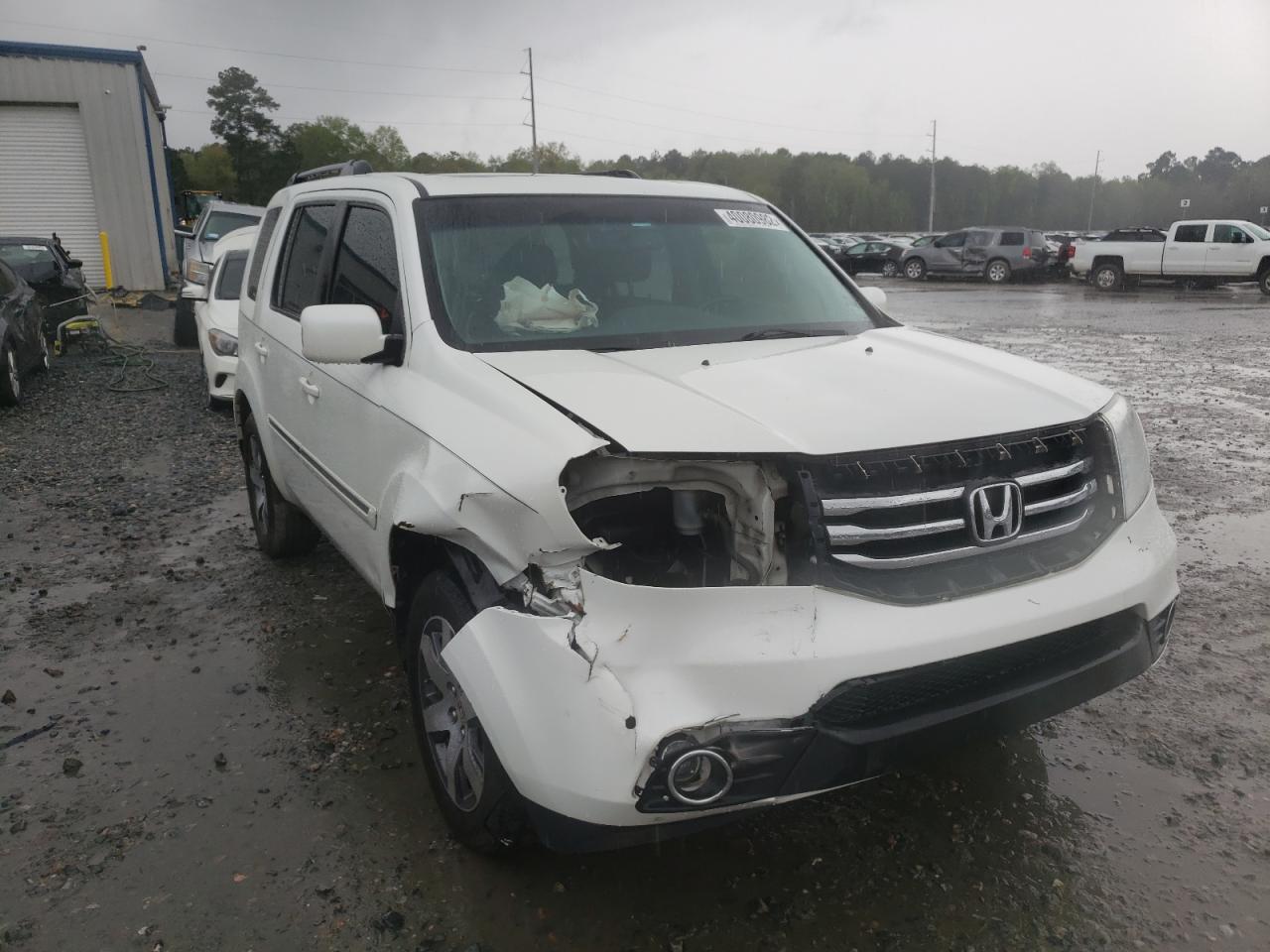 HONDA PILOT TOUR 2012 with VIN 5FNYF3H92CB042049 - Photo from auction