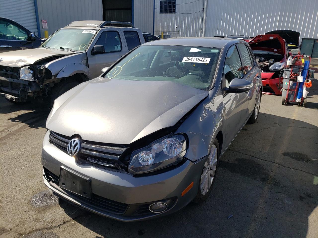 Photo 2 from auction – 2014 VOLKSWAGEN GOLF with VIN WVWNM7AJ9EW008967