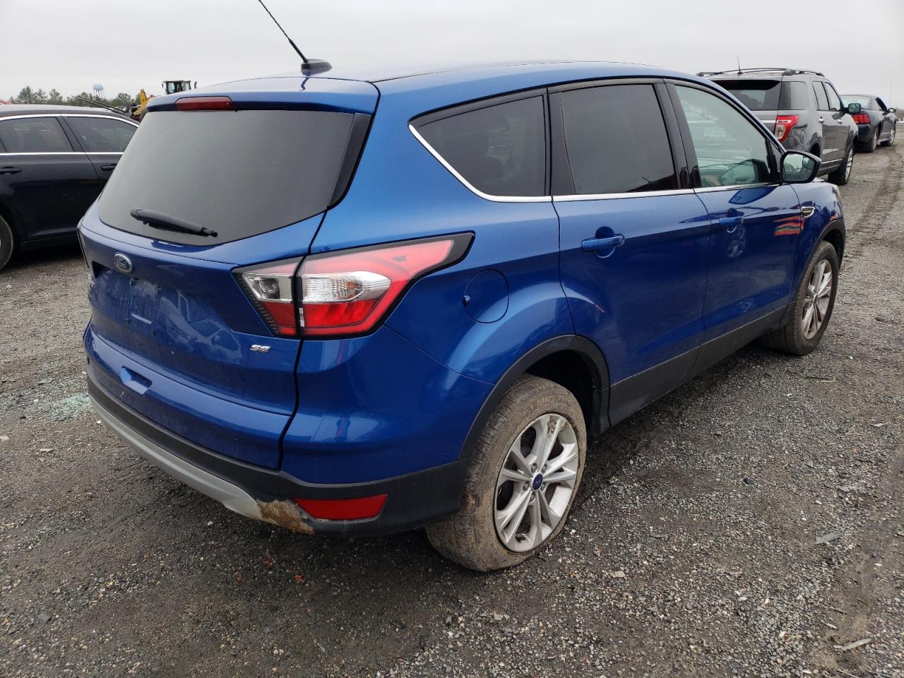 Photo 4 from auction – 2017 FORD ESCAPE SE with VIN 1FMCU9GD0HUC42155