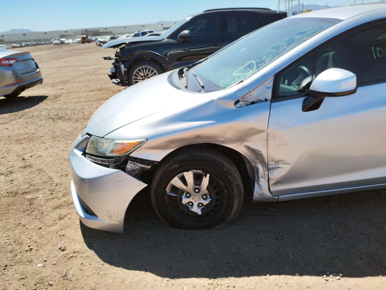 Photo 9 from auction – 2012 HONDA CIVIC LX with VIN 2HGFG3B57CH520066