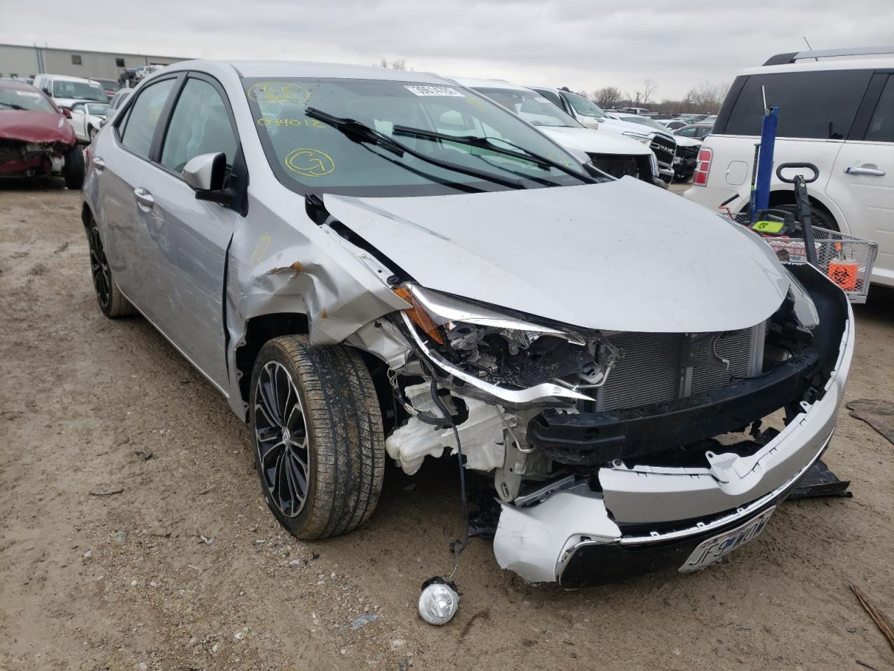 TOYOTA COROLLA L 2014 with VIN 5YFBURHE4EP094012 - Photo from auction
