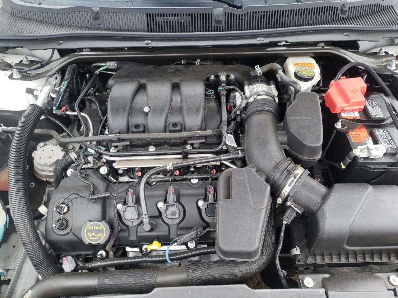 Photo 7 from auction – 2014 FORD TAURUS SEL with VIN 1FAHP2E83EG169877