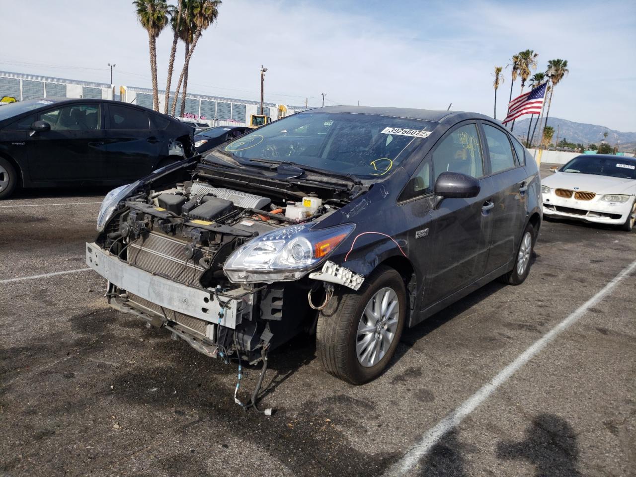 Фото 2 с аукциона – 2014 TOYOTA PRIUS PLUG с VIN JTDKN3DP0E3060532