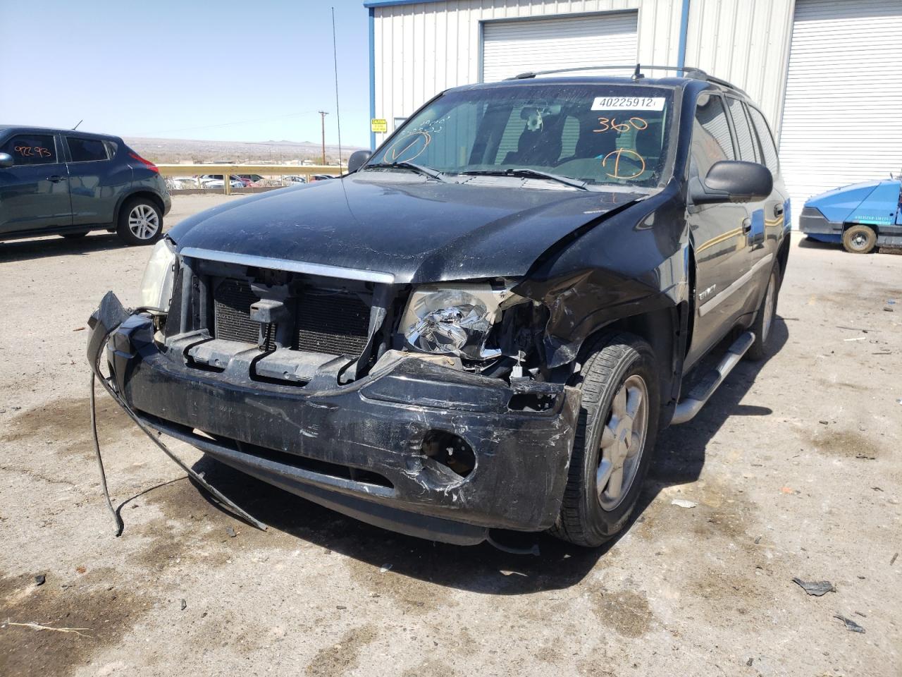 Photo 9 from auction – 2006 GMC ENVOY with VIN 1GKDS13SX62228975