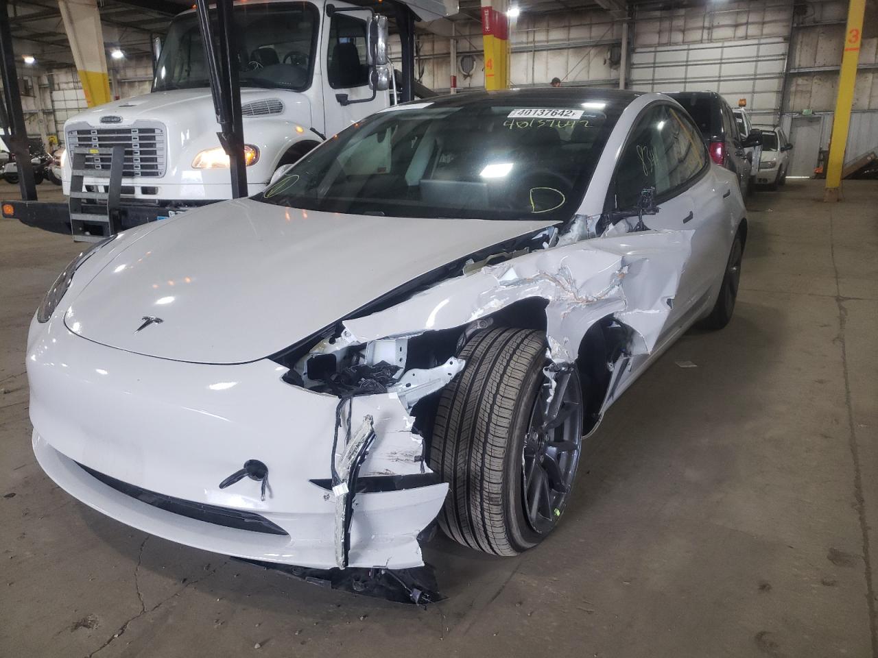 Photo 2 from auction – 2021 TESLA MODEL 3 with VIN 5YJ3E1EB7MF066146