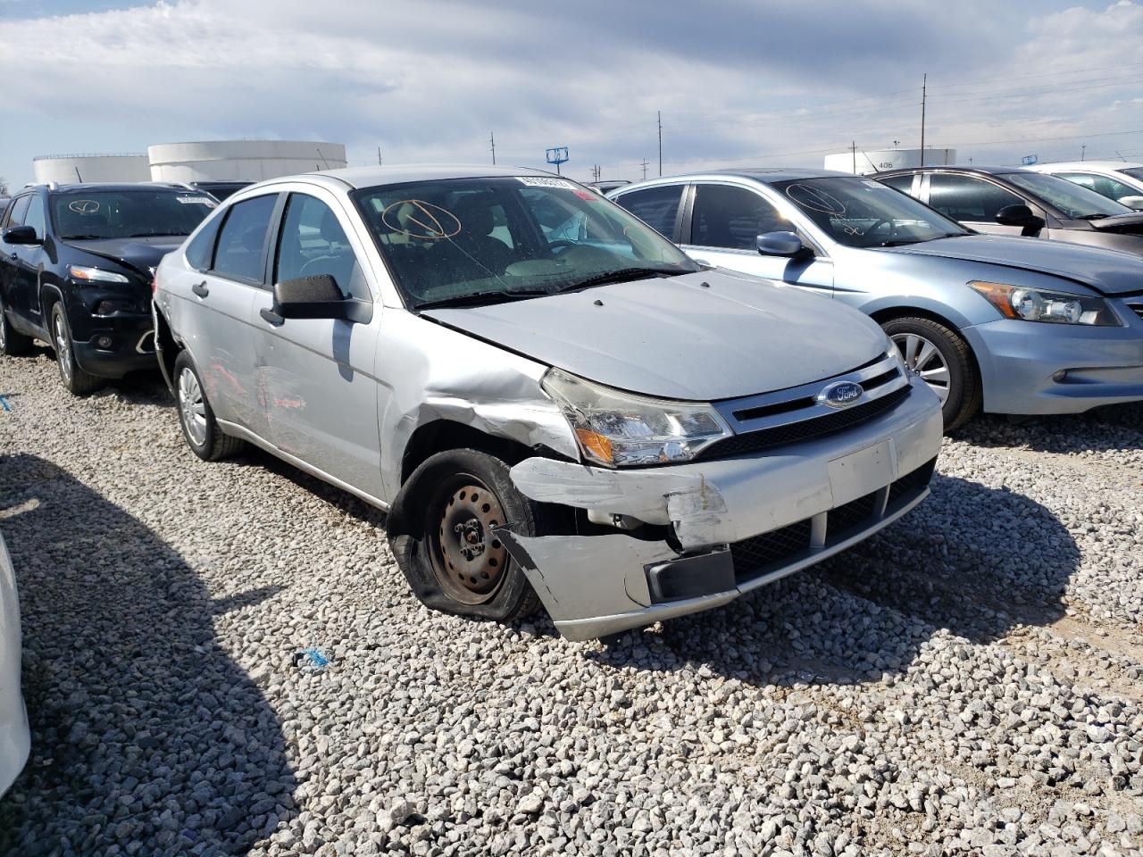 FORD FOCUS S 2009 with VIN 1FAHP34N79W130024 - Photo from auction