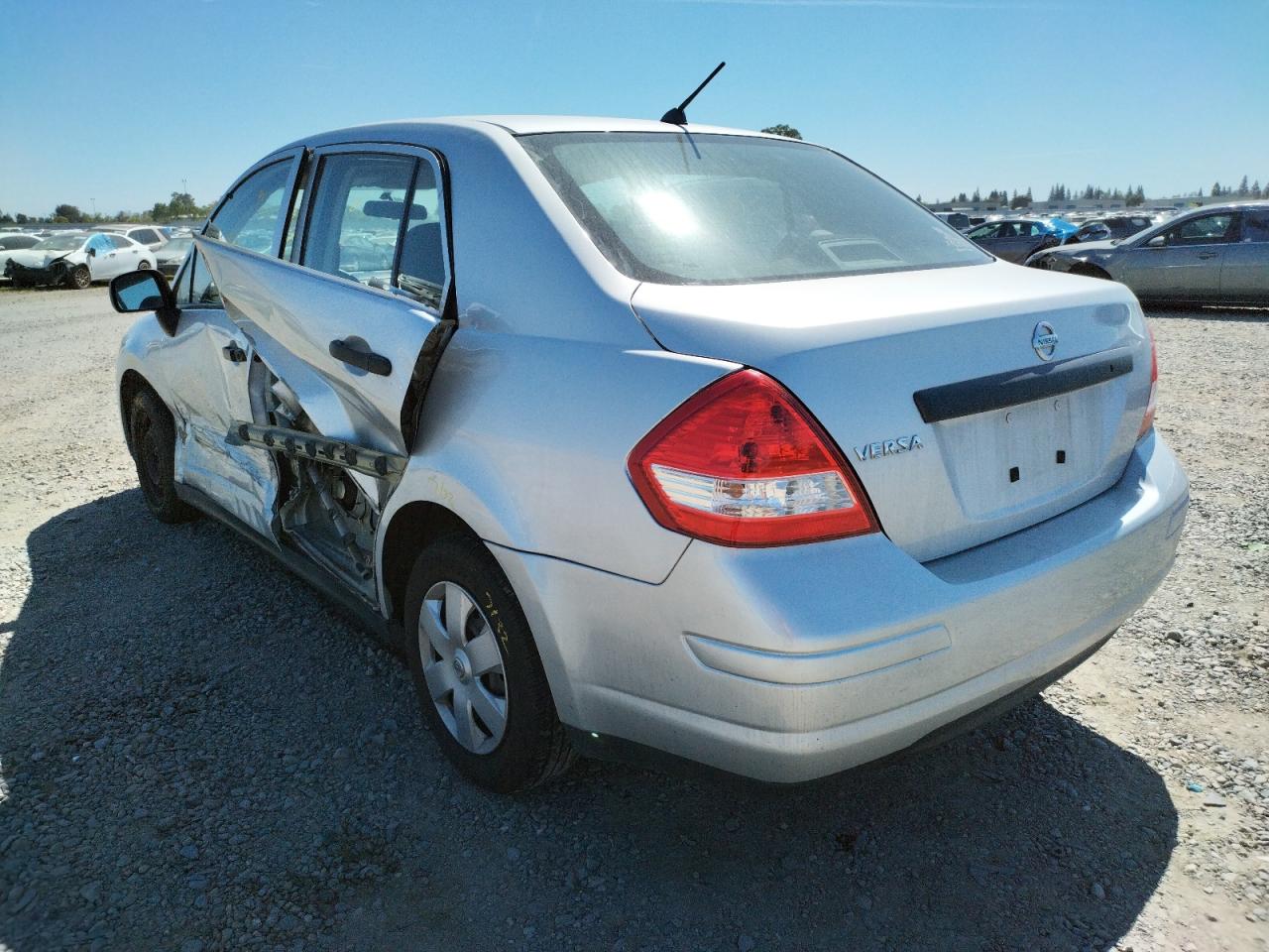 Photo 3 from auction – 2010 NISSAN VERSA with VIN 3N1CC1AP4AL449551