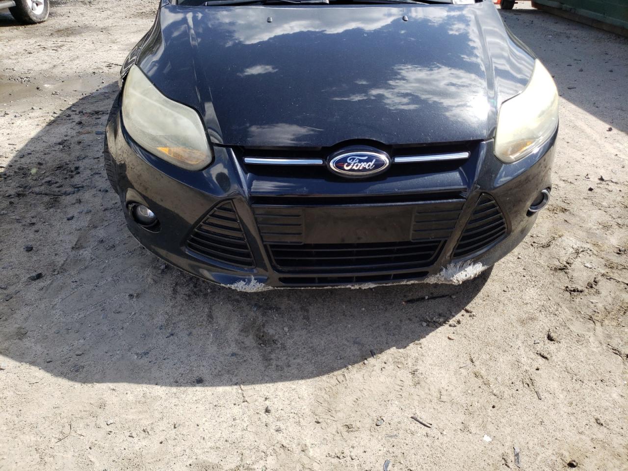Photo 9 from auction – 2014 FORD FOCUS TITA with VIN 1FADP3J22EL141730