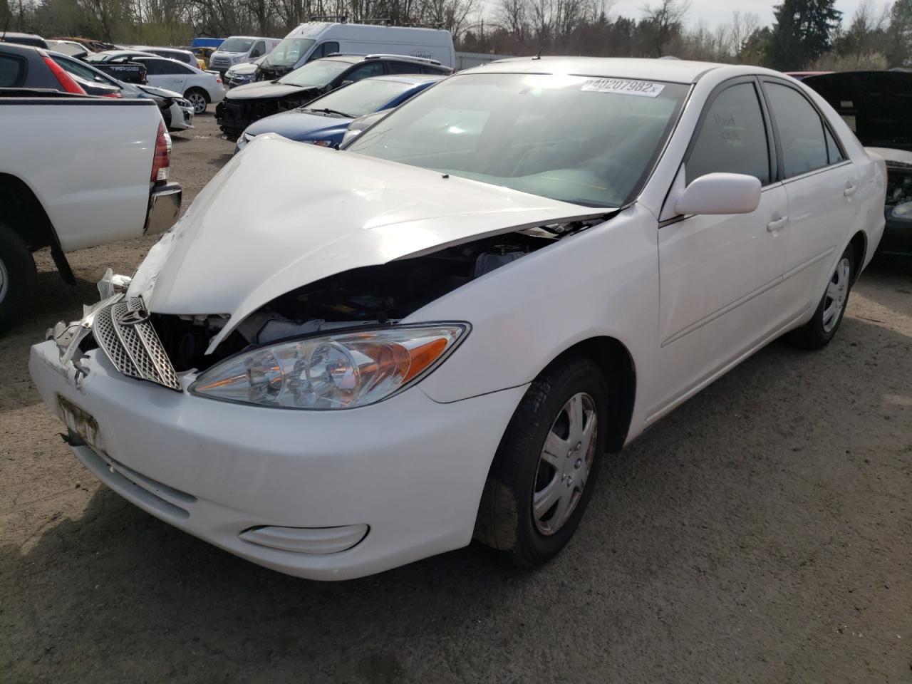 Photo 2 from auction – 2002 TOYOTA CAMRY LE with VIN 4T1BE30K42U560222