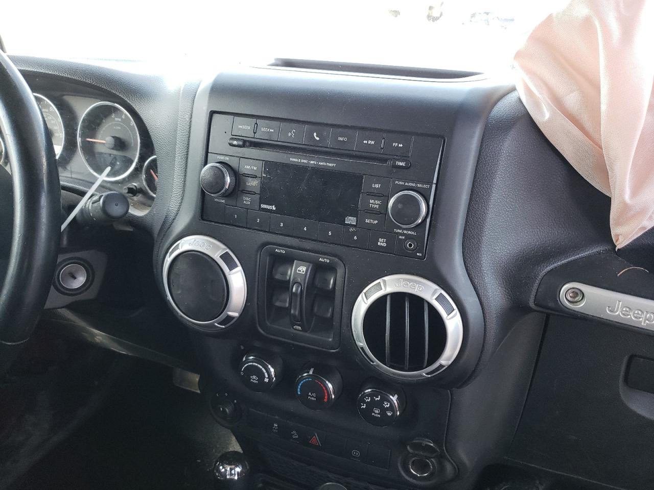 Photo 9 from auction – 2012 JEEP WRANGLER U with VIN 1C4BJWEG2CL124949