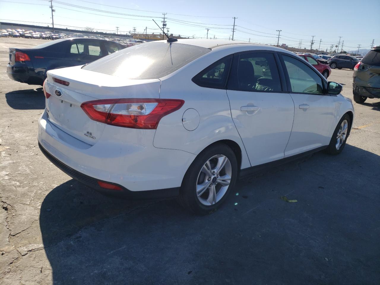 Photo 4 from auction – 2014 FORD FOCUS SE with VIN 1FADP3F28EL255935