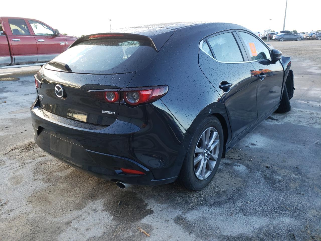 Photo 4 from auction – 2021 MAZDA 3 with VIN JM1BPAJL6M1303061