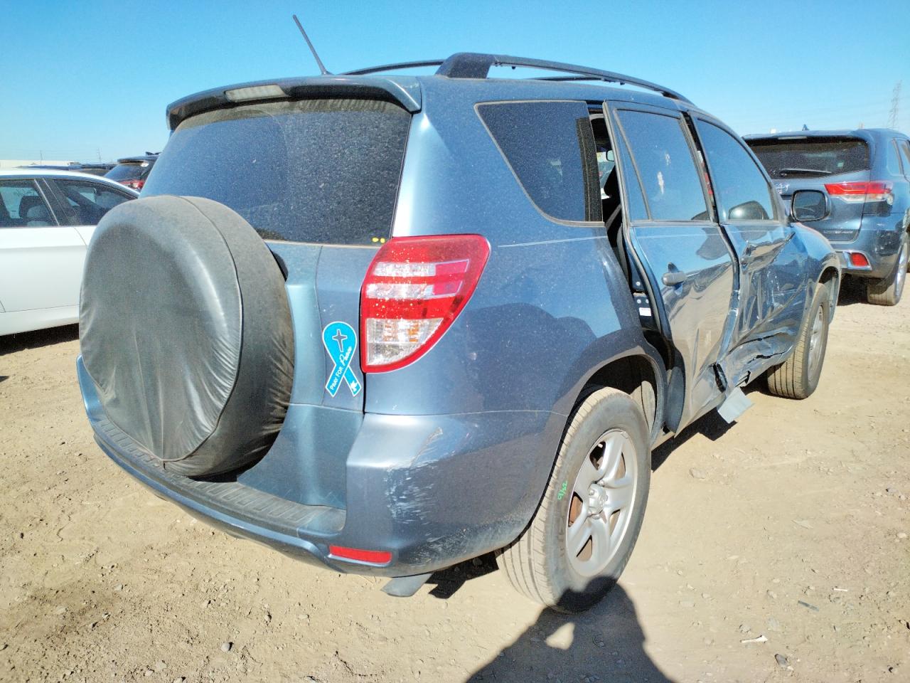 Photo 4 from auction – 2009 TOYOTA RAV4 with VIN JTMZF33VX9D004092