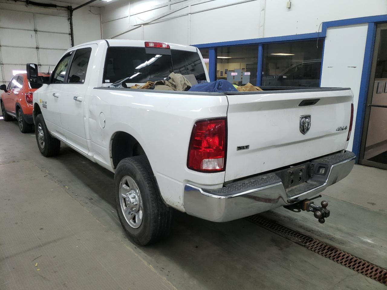 Photo 3 from auction – 2016 RAM 2500 SLT with VIN 3C6TR5DT0GG166259