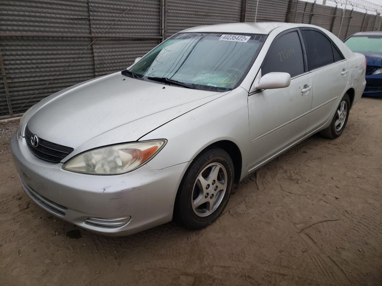 Photo 2 from auction – 2003 TOYOTA CAMRY LE with VIN JTDBE32K530237520