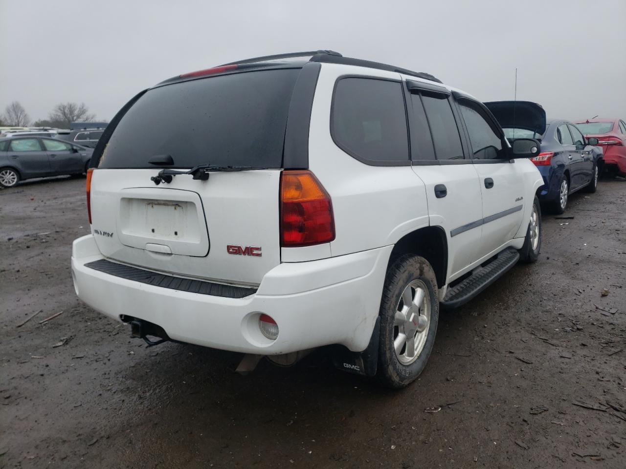 Photo 4 from auction – 2006 GMC ENVOY with VIN 1GKDT13S062156729