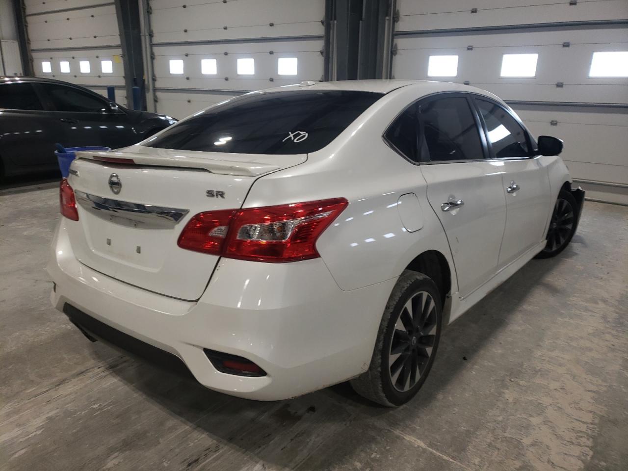 Photo 4 from auction – 2016 NISSAN SENTRA S with VIN 3N1AB7AP1GY297141