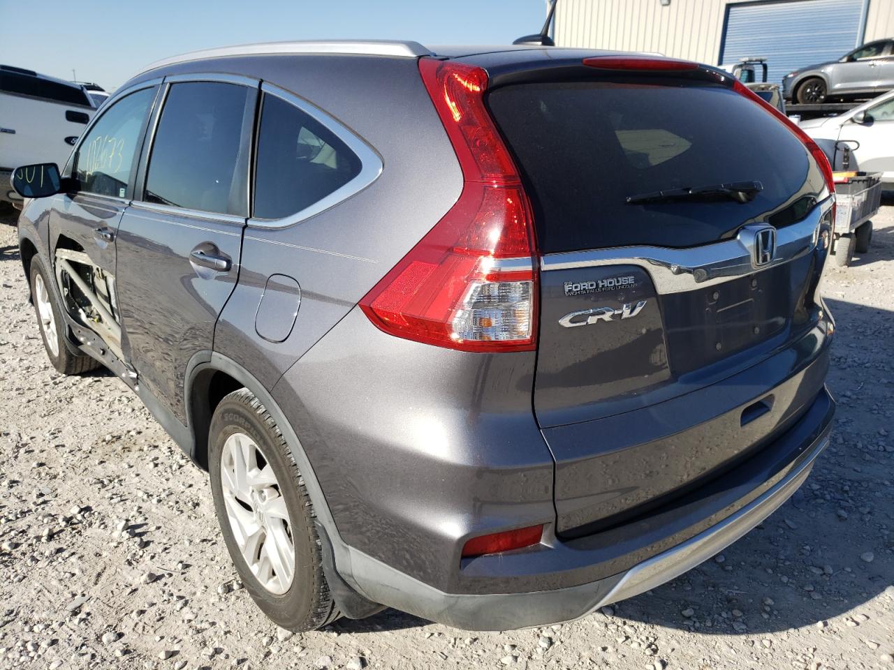 Photo 3 from auction – 2015 HONDA CR-V EXL with VIN 2HKRM3H77FH559068