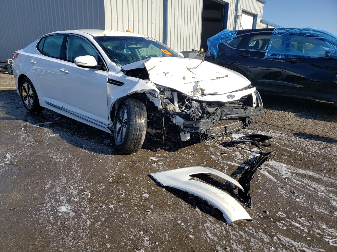 KIA OPTIMA HYB 2011 with VIN KNAGM4ADXB5004765 - Photo from auction